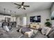 Spacious living room featuring a large sectional sofa, media center, and open access to the kitchen area at 5406 Longhorn Dr., Myrtle Beach, SC 29588