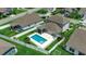 Aerial view of a home's private backyard pool, enclosed by a white fence and surrounded by lush green grass at 5406 Longhorn Dr., Myrtle Beach, SC 29588