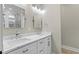 Bathroom with a double vanity, modern lighting, and neutral paint scheme at 6001 - 1793 S Kings Hwy., Myrtle Beach, SC 29575