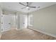 Bedroom with hardwood floors featuring a closet with double doors, and a ceiling fan at 6001 - 1793 S Kings Hwy., Myrtle Beach, SC 29575