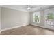 Bedroom featuring hardwood floors, neutral paint, and access to a private deck at 6001 - 1793 S Kings Hwy., Myrtle Beach, SC 29575