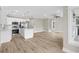 Spacious living space with an open kitchen, hardwood floors, and stainless steel appliances at 6001 - 1793 S Kings Hwy., Myrtle Beach, SC 29575