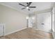 Main bedroom featuring an ensuite bathroom, large closet, and neutral paint at 6001 - 1793 S Kings Hwy., Myrtle Beach, SC 29575