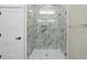 Walk in shower with glass doors and marble tile at 6001 - 1793 S Kings Hwy., Myrtle Beach, SC 29575