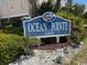 Ocean Pointe condo sign with detailed landscaping and mature shrubs adding to the curb appeal at 6103 N Ocean Blvd. # C-6, North Myrtle Beach, SC 29582