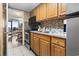 Efficient kitchen with modern appliances, cabinetry, and a view to the dining area and ocean views at 6804 N Ocean Blvd. # 829, Myrtle Beach, SC 29572
