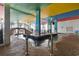 Indoor pool area featuring colorful decor and a bridge leading to outdoor lounging at 6804 N Ocean Blvd. # 829, Myrtle Beach, SC 29572