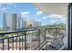 Balcony featuring chairs and a view of the street, beach, and nearby buildings at 7100 N Ocean Blvd. # 320, Myrtle Beach, SC 29572