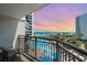 Balcony view overlooking the pool, beach, and ocean during a vibrant sunset at 7100 N Ocean Blvd. # 320, Myrtle Beach, SC 29572