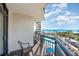 Tranquil balcony with partial chairs showcases ocean, beach, and pool views at 7100 N Ocean Blvd. # 320, Myrtle Beach, SC 29572