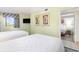 Another view of the guest bedroom with two beds and serene decor at 7100 N Ocean Blvd. # 320, Myrtle Beach, SC 29572