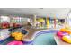 The indoor waterpark features shallow pools, playful fountains, and colorful decorations for year-round fun at 7100 N Ocean Blvd. # 320, Myrtle Beach, SC 29572