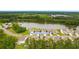 Lovely aerial view of 736 Flowering Branch Ave. surrounded by lush green trees at 736 Flowering Branch Ave., Little River, SC 29566