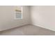 Bedroom with a window, carpet, and neutral walls at 736 Flowering Branch Ave., Little River, SC 29566