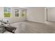 Bright, open living room with wood-look floors, natural light, and a relaxing seating area at 736 Flowering Branch Ave., Little River, SC 29566
