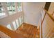 Bright living room area featuring hardwood floors, large windows, and French doors leading outside at 78 Oakmont Dr., Pawleys Island, SC 29585