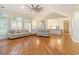 Open-concept living room with hardwood floors and seamless transition to the kitchen at 78 Oakmont Dr., Pawleys Island, SC 29585