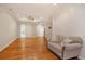 Living room with hardwood floors, recessed lighting, and a comfortable sofa at 78 Oakmont Dr., Pawleys Island, SC 29585