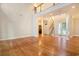 Spacious living room with gleaming hardwood floors, tall ceilings, and ample natural light at 78 Oakmont Dr., Pawleys Island, SC 29585