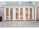 Spacious tiled patio with multiple glass doors providing great natural light at 78 Oakmont Dr., Pawleys Island, SC 29585