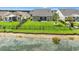 Aerial view of the backyard and pond showing the home's private lot and outdoor space at 802 Devon Estate Ave., Myrtle Beach, SC 29588