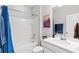 Clean bathroom with white subway tile, blue accents and modern fixtures at 802 Devon Estate Ave., Myrtle Beach, SC 29588