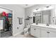 Spacious bathroom features dual sinks, walk-in closet and neutral color palette at 802 Devon Estate Ave., Myrtle Beach, SC 29588