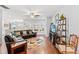 Spacious living room with hardwood floors, comfortable seating, and bright natural light at 802 Devon Estate Ave., Myrtle Beach, SC 29588