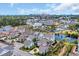 Panoramic community view showcasing homes, a pond, landscaping, and distant ocean views at 8185 Sandlapper Way, Myrtle Beach, SC 29572