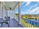 Scenic balcony overlooking a serene pond and community, perfect for relaxing and enjoying the view at 8185 Sandlapper Way, Myrtle Beach, SC 29572