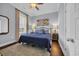 Charming bedroom with a comfortable bed, side tables, and ample natural light for a serene retreat at 8185 Sandlapper Way, Myrtle Beach, SC 29572