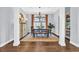 Elegant dining room featuring a chandelier, large window, and stylish furnishings at 8185 Sandlapper Way, Myrtle Beach, SC 29572