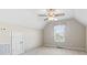 Neutral toned bedroom featuring carpet flooring, ceiling fan, and window with natural light at 8204 Caddis Ct., Myrtle Beach, SC 29579
