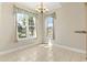 Cozy breakfast nook with two windows offering picturesque views of a pond and outdoor scenery at 8204 Caddis Ct., Myrtle Beach, SC 29579