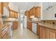 Functional kitchen with ample cabinets, granite countertops, and appliances for efficient meal preparation at 8204 Caddis Ct., Myrtle Beach, SC 29579