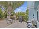 Inviting backyard features a patio with grill, table and chairs, ideal for outdoor dining and relaxing at 843 Villa Dr. # 843, North Myrtle Beach, SC 29582