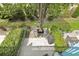 Top view of a private backyard with patio, landscaping and outdoor furniture, perfect for relaxing and entertaining at 843 Villa Dr. # 843, North Myrtle Beach, SC 29582