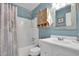 Well-maintained bathroom features a shower with a curtain, a cabinet, and a sink with vanity at 843 Villa Dr. # 843, North Myrtle Beach, SC 29582