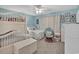 Charming bedroom with bunkbeds, a single bed, and coastal decor creates a serene sleeping space at 843 Villa Dr. # 843, North Myrtle Beach, SC 29582