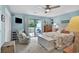 Light-filled bedroom with balcony access, a ceiling fan, and soothing decor offers a relaxing retreat at 843 Villa Dr. # 843, North Myrtle Beach, SC 29582