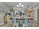 Dining room with rustic wooden table and chairs, plus stylish decor at 843 Villa Dr. # 843, North Myrtle Beach, SC 29582