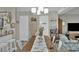 This dining room has a chandelier and coastal style decor at 843 Villa Dr. # 843, North Myrtle Beach, SC 29582