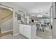Open concept kitchen with dining room and light blue dining chairs at 843 Villa Dr. # 843, North Myrtle Beach, SC 29582