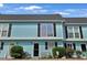 Inviting condo exterior with black shutters and well maintained facade at 843 Villa Dr. # 843, North Myrtle Beach, SC 29582