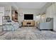 Comfortable living room with cozy seating and entertainment center at 843 Villa Dr. # 843, North Myrtle Beach, SC 29582
