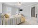 Bedroom featuring a neutral color palette and two large windows for natural light at 856 W Highway 9, Longs, SC 29568