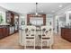 Spacious kitchen features a large island, stainless steel appliances and wooden cabinetry at 856 W Highway 9, Longs, SC 29568