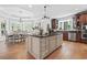 Gourmet kitchen featuring a center island, granite countertops, stainless steel appliances, and a breakfast nook at 856 W Highway 9, Longs, SC 29568