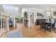 Open-concept living room with hardwood floors, and lots of natural light at 856 W Highway 9, Longs, SC 29568