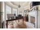 Office featuring a fireplace, hardwood floors, and multiple windows for great natural light at 856 W Highway 9, Longs, SC 29568